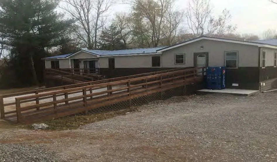 Paddle Trail Campground — picnic gathering at the riverside pavilion