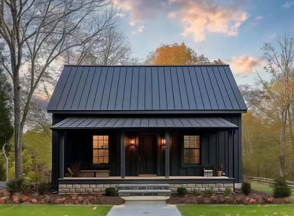 Resort cabin at dusk with warm interior light — Kumberland destination in Kentucky